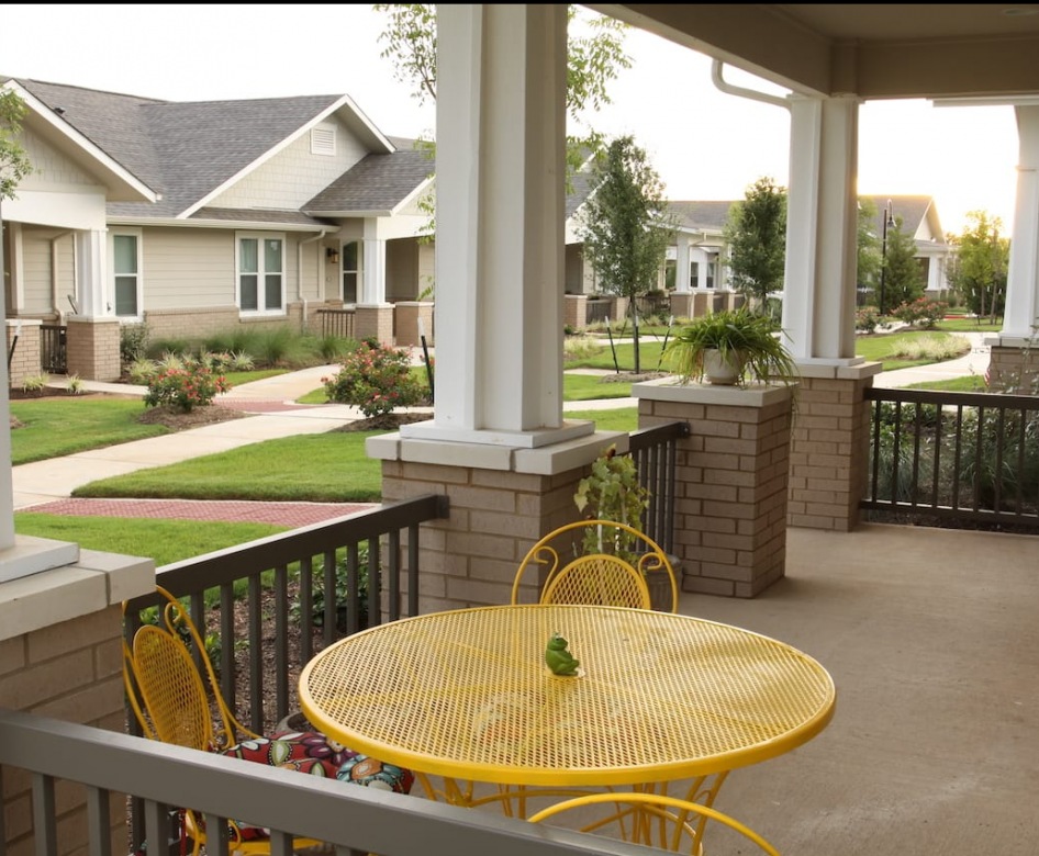 spacious patio with views of the property buildings